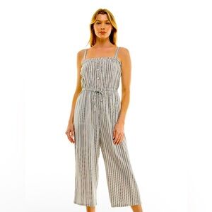 New without tags, black and white striped jumpsuit, size large